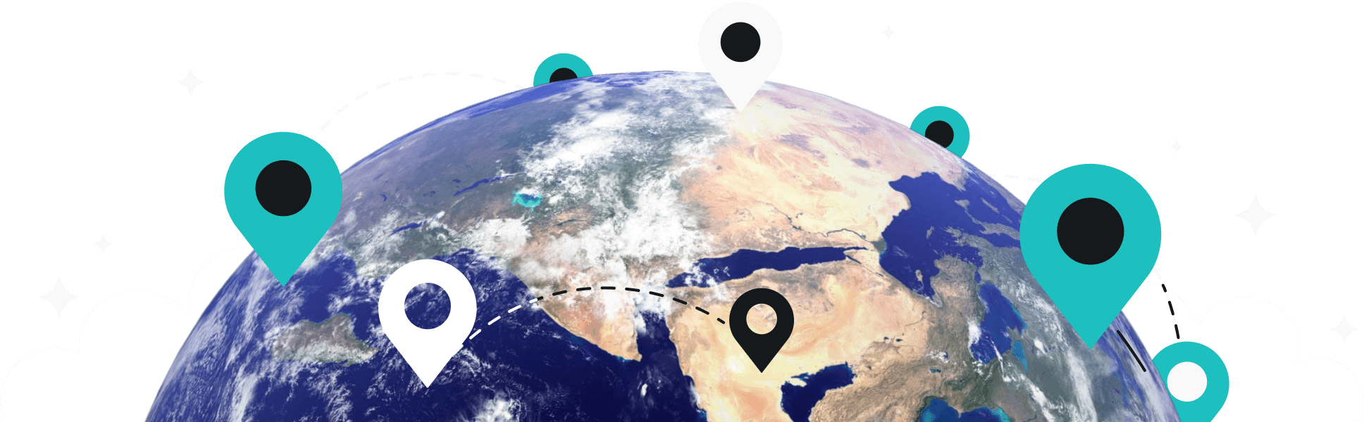 Le globe avec de nombreuses épingles pointant vers des endroits différents.