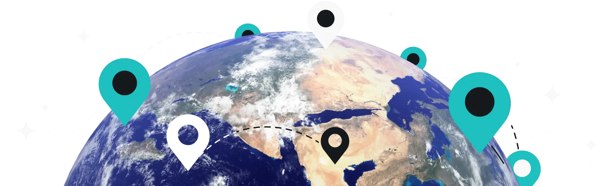 Le globe avec de nombreuses épingles pointant vers des endroits différents.