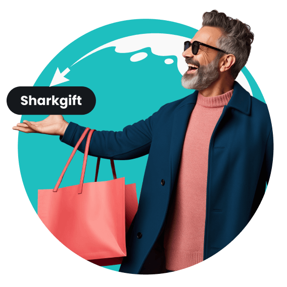 A laughing man in sunglasses holding a pink bag; a text box hovers over the bag with the text Sharkgift.