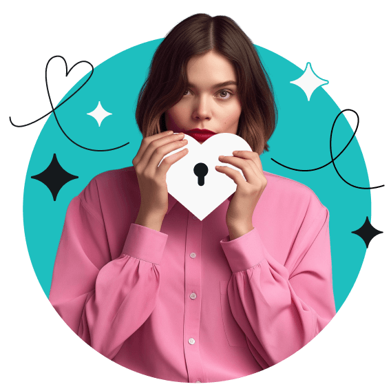 A woman with short brown hair in a pink long-sleeve shirt, holding a white heart with a keyhole in the middle.