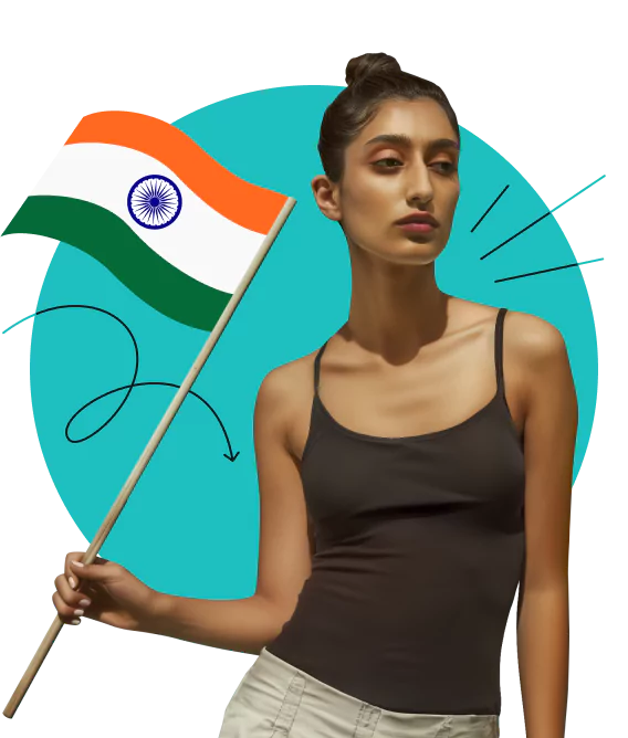 A woman in a black tank top with her hair tied in a bun holding the Indian flag.