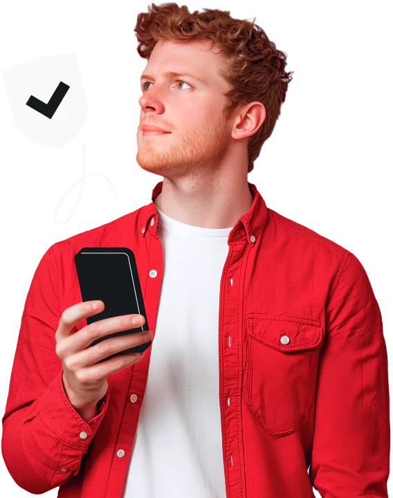 A man with red hair in a red shirt holding a smartphone, with a checkmarked shield icon and a squiggle in the background.