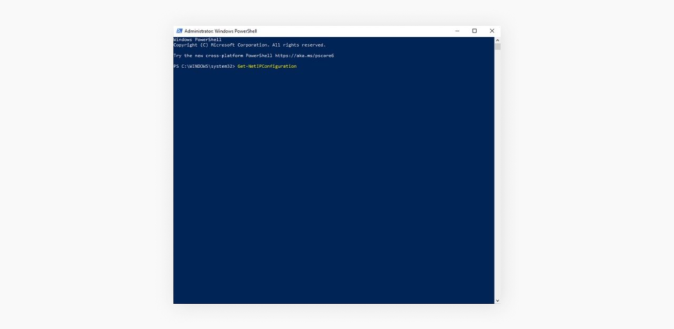 Screenshot of a Windows PowerShell console running as administrator with the command GetNetIPConfiguration displayed.
