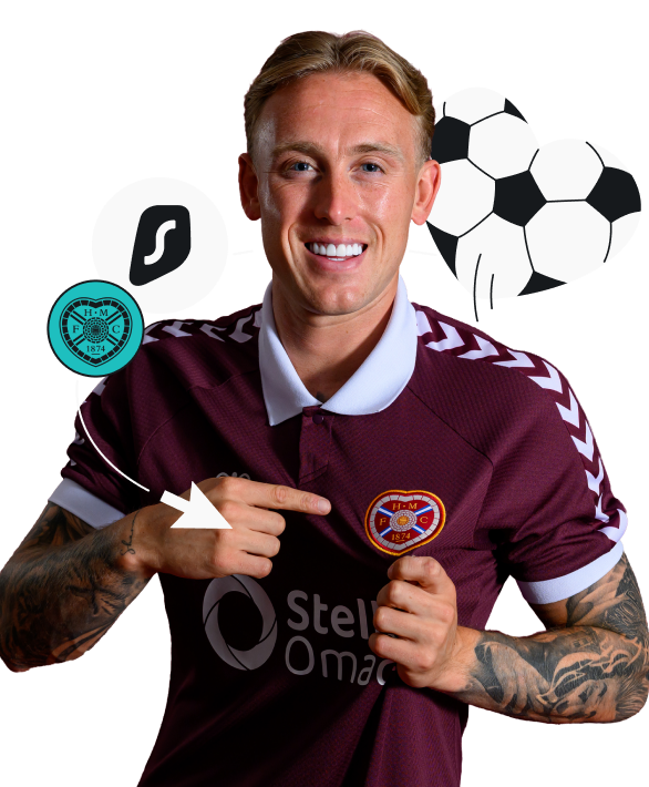 A smiling Calvin Miller in a maroon jersey standing by the Surfshark logo and the Heart of Midlothian Football Club crest.
