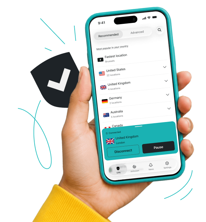 Hand holding a phone showing a VPN location list with United Kingdom connected.