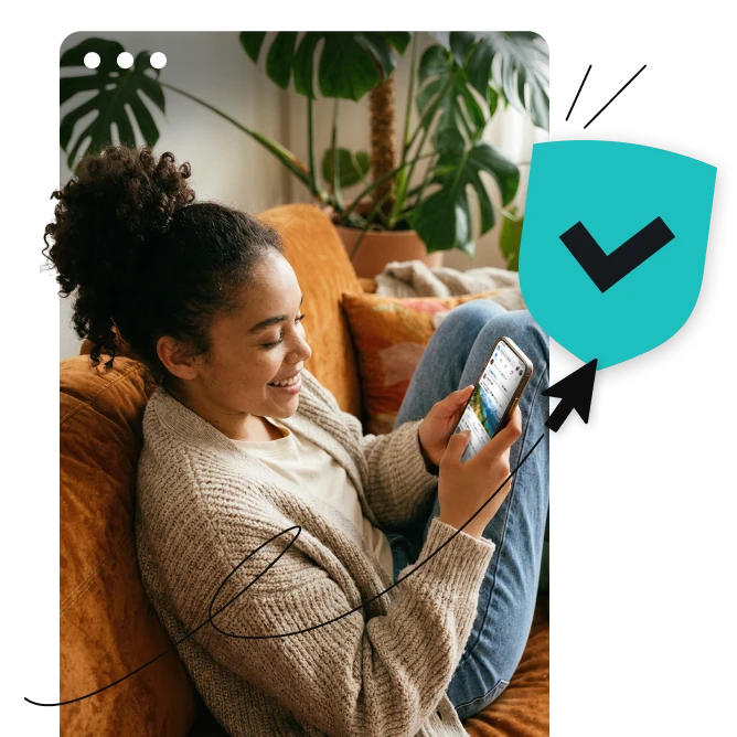 Woman sitting on a couch using a smartphone beside a teal shield with a check mark