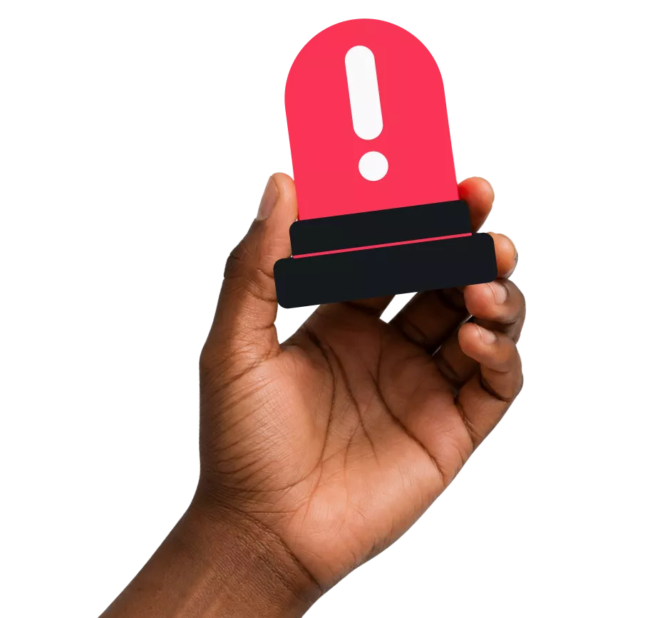 A hand holding a red siren icon with a white exclamation point on a black background.