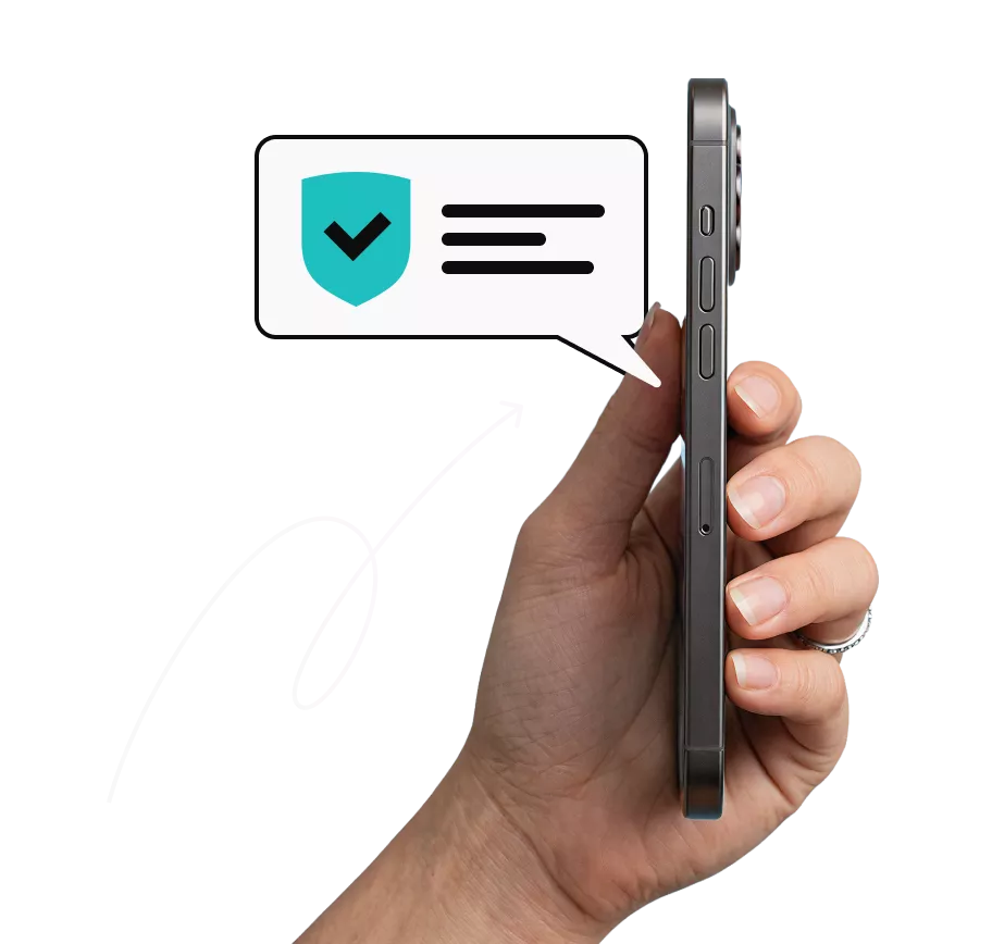 Hand holding a smartphone beside a security checkmark notification