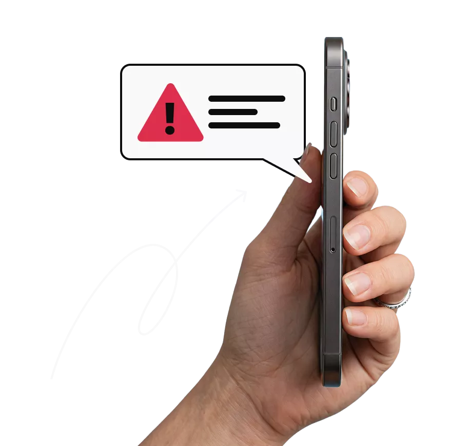 Hand holding a smartphone beside a security checkmark notification