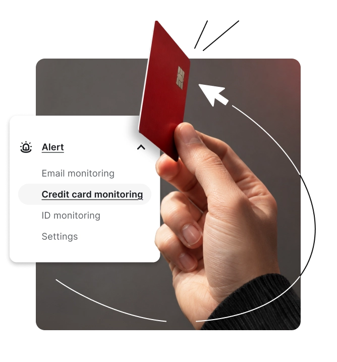 Hand holding a red credit card beside a white menu with Alert and Credit card monitoring.