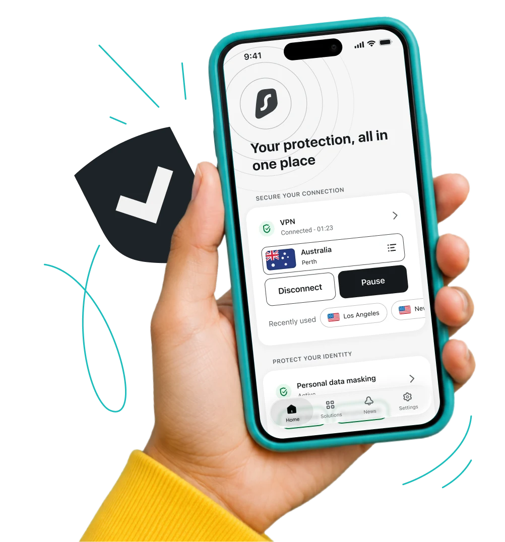 Hand holding a smartphone with a Surfshark VPN app interface and the words Your protection, all in one place at the top.